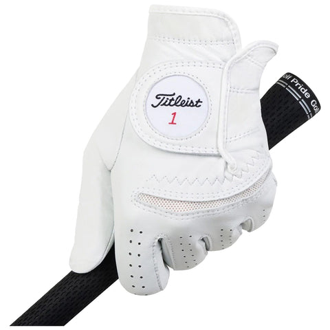 A white golf glove grips a black club handle showcasing sleek leather material and mesh ventilation spots designed for comfort during a game on the golf course.