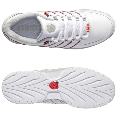 A pair of white sports shoes with red accents sits flat, showcasing a smooth, rubber sole and structured upper. The interior is lightly padded for comfort.