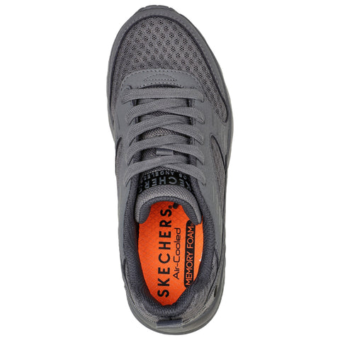 A grey sneaker features a mesh design and is lace-up. The inside displays an orange insole labeled Skechers Air-Cooled Memory Foam, suggesting comfort and breathability.