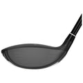 A golf club head is shown tilted with a smooth black striking surface and a polished edge the club is positioned for a swing against a plain white background.