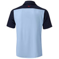 A light blue polo shirt with dark blue sleeves is displayed from the back featuring a small red logo at the neck primarily designed for casual or sports wear.