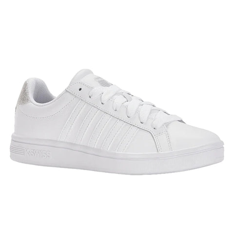 A white sneaker is displayed with laces and a shiny silver heel accent set against a plain background emphasizing its sleek design and casual style.