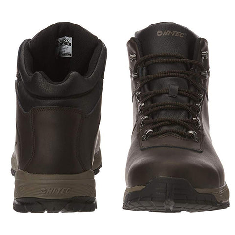 Brown hiking boots with a sturdy design are positioned upright facing forward showcasing laces and a reinforced toe area against a plain background.