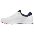 A white sneaker with a textured dark blue collar sits horizontally with a smooth rounded toe and a supportive sole designed for comfort and casual wear