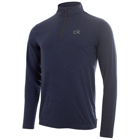 A long sleeve navy blue pullover shirt with a half zipper and a small logo on the chest is displayed against a plain background, showcasing its design and color.