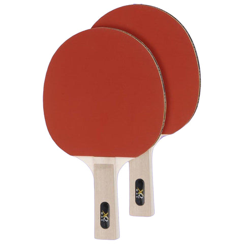 Two red table tennis paddles are positioned overlapping each other with wooden handles facing down in a plain white background, ready for use in a game or practice.