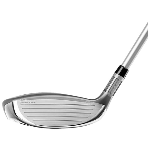 A golf club head is positioned at an angle showcasing its glossy surface and grooved face designed for precision striking in a sporting context.