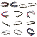 Multiple lanyards and straps are arranged in various colors and styles displaying clips and hooks they are used for holding objects in a well-lit background.