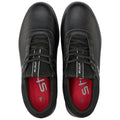 Black shoes are positioned side by side displaying a smooth leather texture and prominent laces with red insoles and branding visible inside for a sporty look in a simple setting.