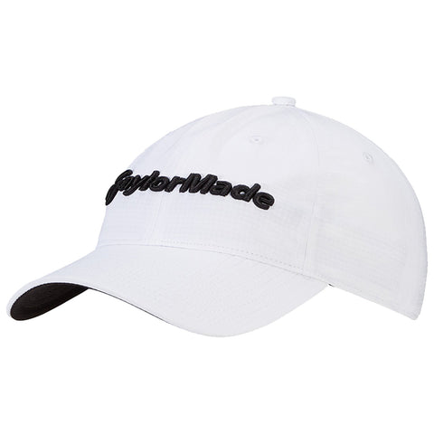 A white baseball cap with a black embroidered logo reads TaylorMade positioned at an angle showcasing the curved brim and structured design ideal for casual or sportswear settings.