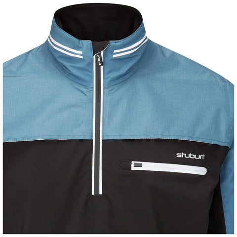 A half-zip pullover features a blue upper section and a black lower section with a zippered pocket. The collar is high with two white stripes, providing a sporty look.