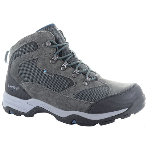 A gray hiking boot features a combination of suede and mesh materials with metal eyelets and laces securely fastened designed for outdoor activity and rugged terrain.