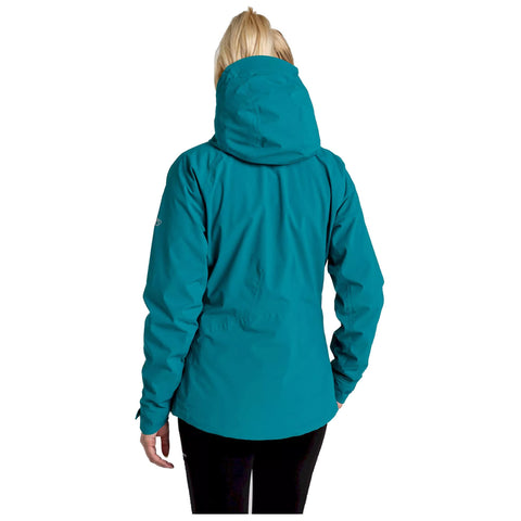 A person wears a teal jacket with a hood facing away while standing upright in the image context is neutral and lacks specific environmental details