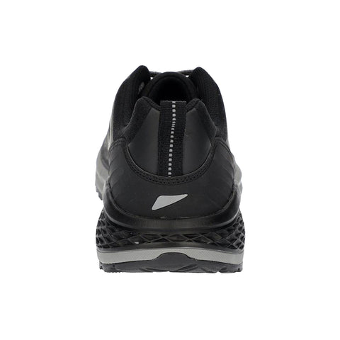 A black athletic shoe stands upright showcasing its rear view with a textured heel and reflective accents situated against a plain white background.