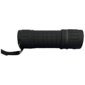 A black flashlight lies horizontally featuring a textured grip and a lanyard attachment suggesting a portable design for use in dark environments or outdoor settings