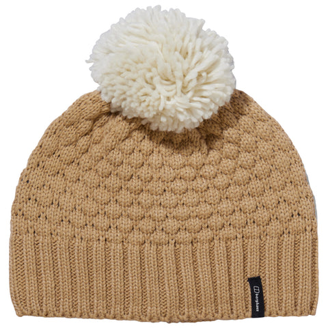 A beige knitted beanie sits upright featuring a large white pom-pom on top with a textured pattern and a ribbed cuff at the bottom, suitable for cold weather wear.