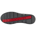 A grey shoe sole with a red logo is displayed. The sole features a textured surface with various patterns for traction, suggesting it is designed for sport or outdoor activities.