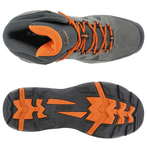 A gray hiking boot features orange laces and an inner lining. The sole is black with orange accents designed for traction, displaying a rugged tread pattern suitable for outdoor activities.