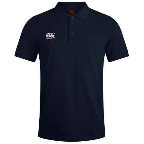 A navy blue polo shirt with short sleeves and a collar features a white Canterbury logo on the left side of the chest and three buttons down the front