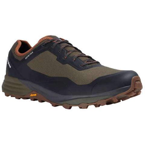 A hiking shoe designed for outdoor use features a dark grey and olive green upper with a rugged sole for traction showcasing laces and a waterproof GORE-TEX label.