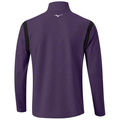 A purple athletic jacket with a high collar and long sleeves features black shoulder panels and a small logo on the back, designed for activewear in a casual setting.