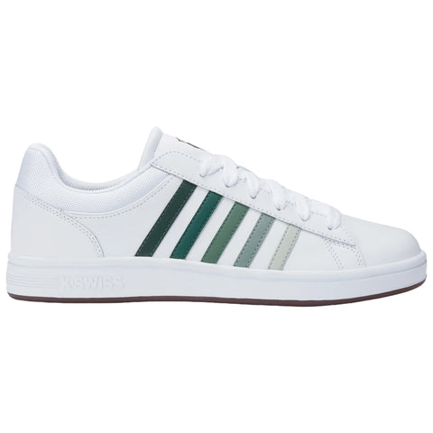 White athletic sneaker features multiple green stripes on the side and a textured surface. It is positioned against a plain background, showcasing its design and color contrast.