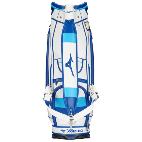 A golf bag stands upright showcasing a white and blue design with straps and zippers highlighting its functionality and style meant for outdoor golfing activities.