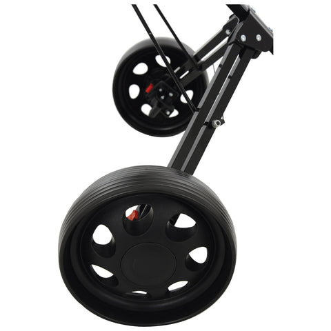 A black wheeled cart with large, sturdy wheels is positioned upright showing the lower part of its frame suggesting it is designed for movement on various surfaces.