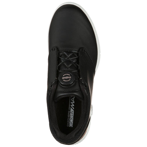 A black athletic shoe is positioned with the top view displayed featuring a slip-on style and textured upper highlighting the Skechers logo and a cushioning insole designed for comfort.