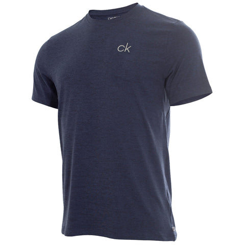 A navy blue short-sleeve t-shirt is displayed standing upright showing a small embroidered logo on the upper left side in light color against a plain background.