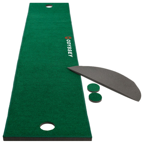 A green putting mat is laid out flat featuring a hole at one end with accompanying circular markers and an alignment guide on the side designed for practicing golf strokes indoors.