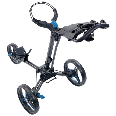 A golf push cart features a lightweight frame with three wheels a handle for steering and a platform for carrying golf bags in an outdoor setting.