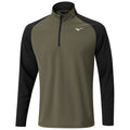 A long-sleeved athletic shirt features a quarter-zip collar with olive green front and black sleeves displaying a logo on the chest designed for active use and comfort.