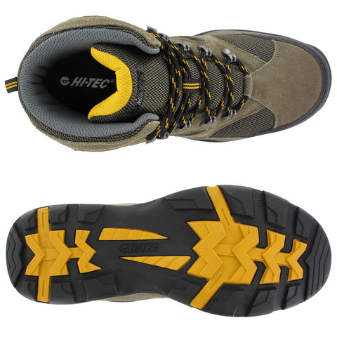 A pair of hiking boots is positioned with the top view showing the inner lining and laces while the sole is displayed below showcasing a tread pattern and branding.