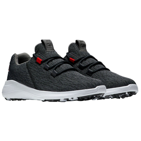 A pair of black and gray golf shoes are displayed with laces secured They feature a textured upper and a white sole with black traction patterns against a plain white background