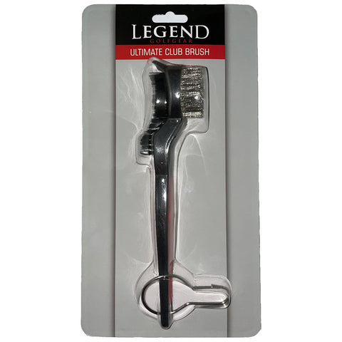 A golf club brush aids in cleaning golf clubs with bristles and a metal scraper attached to a sleek handle displayed in clear packaging against a plain white background. Text reads LEGEND GOLFGEAR ULTIMATE CLUB BRUSH.Cleaning Brush