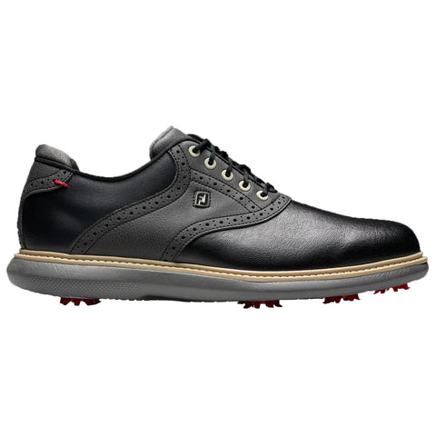 A golf shoe sole is displayed featuring red spikes strategically placed for grip it is designed for use on grassy surfaces such as golf courses