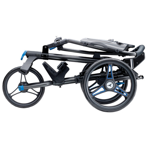 A folded lightweight stroller features a sleek black frame with blue accents. It is compact and positioned to show its two large wheels indicative of mobility and ease of transport.