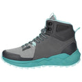 A high-top athletic shoe features a gray mesh upper with teal accents and a rugged sole, designed for outdoor activities, showcased on a white background.