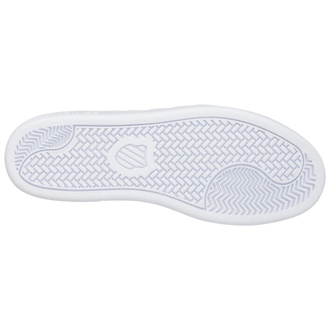 A white shoe sole is displayed flat with a textured pattern for grip and stability showcasing a smooth outer edge and a logo at the center portion of the sole.