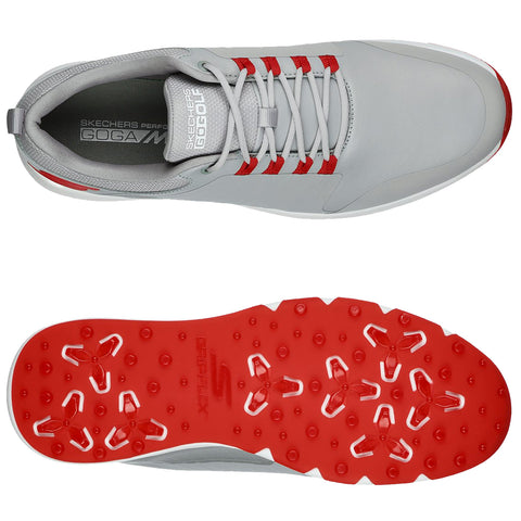 A gray golf shoe with red laces features a textured sole for traction showcasing a modern design. The shoe is positioned to display both the top and bottom views.