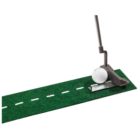 A golf ball is positioned in front of a putter on a green putting mat designed with alignment markings guiding the shot in a focused indoor practice environment