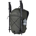 A green backpack features trekking poles secured on either side and a water bottle in a side pocket designed for outdoor activities in a rugged environment.