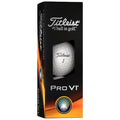 A black box prominently displays a Titleist golf ball labeled Pro V1 through a clear front window showcasing the ball's dimpled surface and brand logo against an orange gradient background.