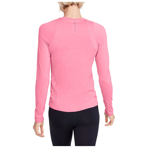 A person is wearing a fitted long-sleeve pink athletic shirt with a smooth texture and black leggings in a neutral setting appropriate for exercise or casual wear.