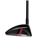 A golf club with a sleek black head and a red accent is positioned upright emphasizing its aerodynamic design for improved performance in a golfing context. The club features a 3D carbon crown for enhanced stability.