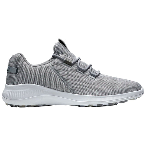 A pair of gray golf shoes is displayed prominently with a textured fabric upper and a white sole featuring traction elements suitable for active use in a variety of environments.