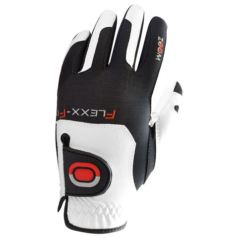 A black and white sports glove rests upright showcasing its padded palm and flexible design ideal for enhancing grip during activities like golfing or driving in various outdoor settings.