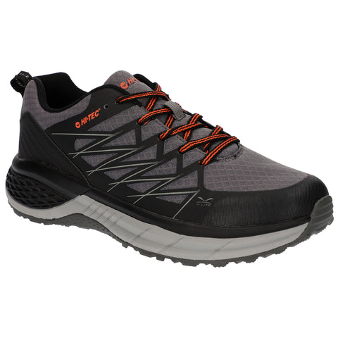 A gray and black athletic shoe is positioned prominently with orange laces and accents The design features a textured upper and a thick sole suggesting durability and support for outdoor activities