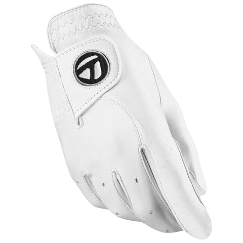 A white golf glove is displayed upright showcasing its smooth leather texture with stitching and a circular logo on the wrist area indicating its brand suitable for improving grip during play